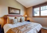 Comfortable queen bed, and soothing cream decor